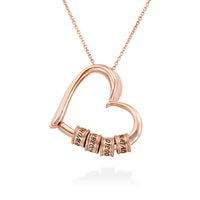 Heart-shaped necklace with love engraved English name