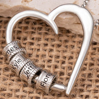 Heart-shaped necklace with love engraved English name