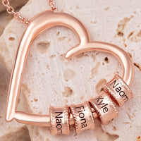 Heart-shaped necklace with love engraved English name