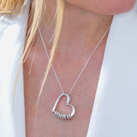 Heart-shaped necklace with love engraved English name